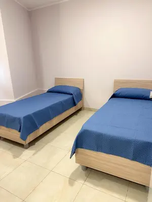 Letto o letti in una camera di Case Demetra