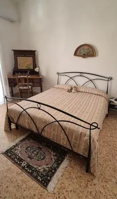 Letto o letti in una camera di Domus Elia