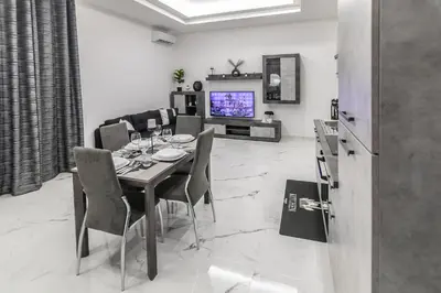 TV o dispositivi per l'intrattenimento presso Amour - House with Private Jacuzzi