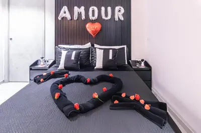 Letto o letti in una camera di Amour - House with Private Jacuzzi