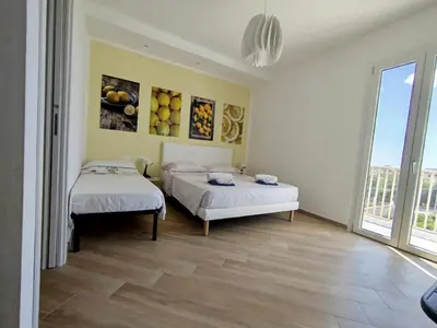Letto o letti in una camera di I sapori della Sicilia