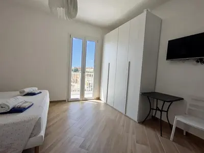 Letto o letti in una camera di I sapori della Sicilia