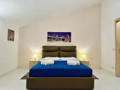Letto o letti in una camera di Unique room