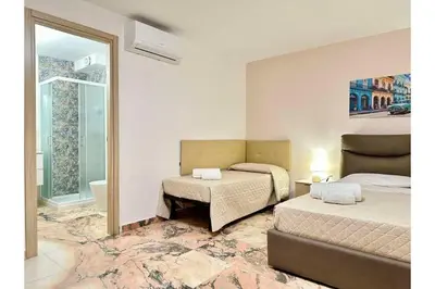 Letto o letti in una camera di Unique room