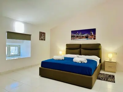 Letto o letti in una camera di Unique room