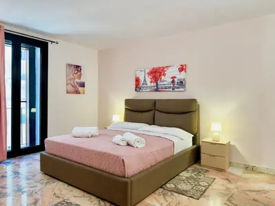 Letto o letti in una camera di Unique room