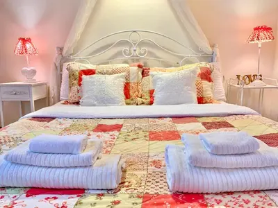 Letto o letti in una camera di Casa Dolce Casa