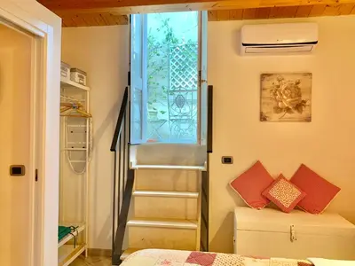 Letto o letti in una camera di Casa Dolce Casa