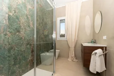 Bagno di Villa Aman piscina e jacuzzi riscaldata