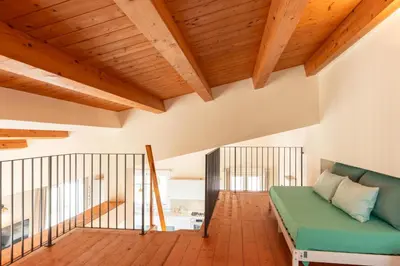 Letto o letti in una camera di Villa Calicanto con jacuzzi riscaldata