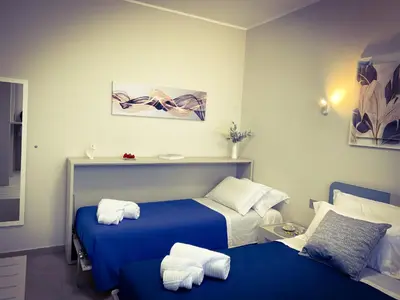 Letto o letti in una camera di La casa di Magi
