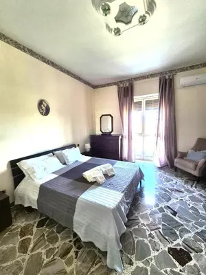 Letto o letti in una camera di Casa Piazza Adda