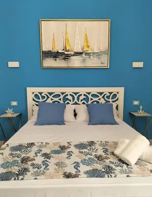 Letto o letti in una camera di Casa vacanze Acquamarina
