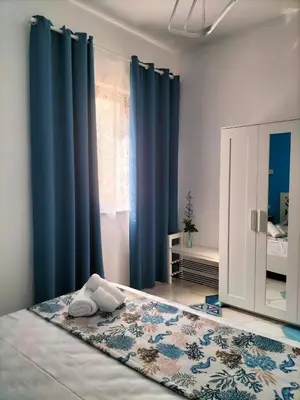 Letto o letti in una camera di Casa vacanze Acquamarina