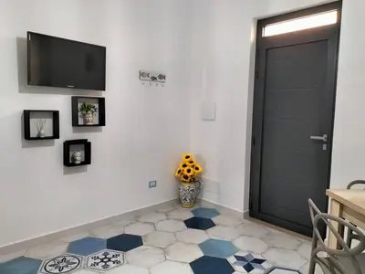 TV o dispositivi per l'intrattenimento presso Casa vacanze Acquamarina