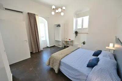 Letto o letti in una camera di Val di Noto Domus Hilaris
