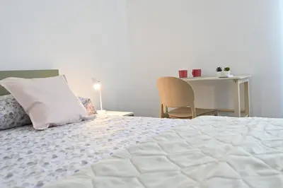 Letto o letti in una camera di Val di Noto Domus Hilaris
