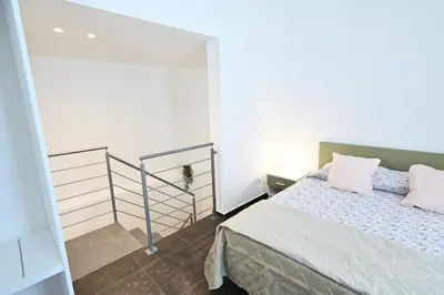 Letto o letti in una camera di Val di Noto Domus Hilaris
