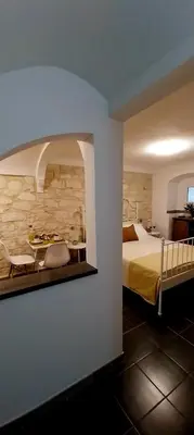 Letto o letti in una camera di Tirella Home