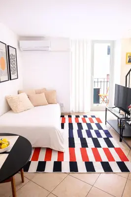 Letto o letti in una camera di Stylish Loft w Balcony-near Duomo and Fish market