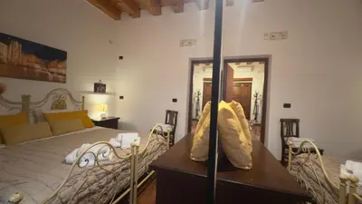 Letto o letti in una camera di Ortigia Plemmirio al Piano Terra