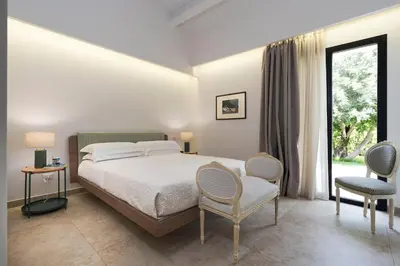 Letto o letti in una camera di Netina Domus