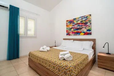 Letto o letti in una camera di Villademar lunarossa