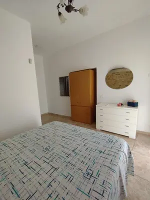 Letto o letti in una camera di Appartamento Il Papavero