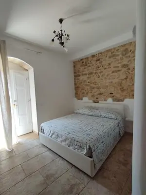 Letto o letti in una camera di Appartamento Il Papavero