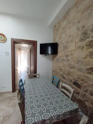 TV o dispositivi per l'intrattenimento presso Appartamento Il Papavero