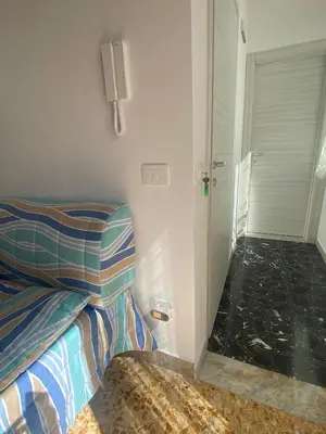 Letto o letti in una camera di Casa vacanze Famiglia MARE