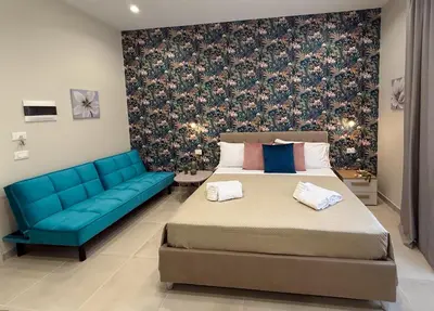 Letto o letti in una camera di Town House 54