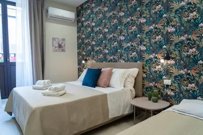 Letto o letti in una camera di Town House 54