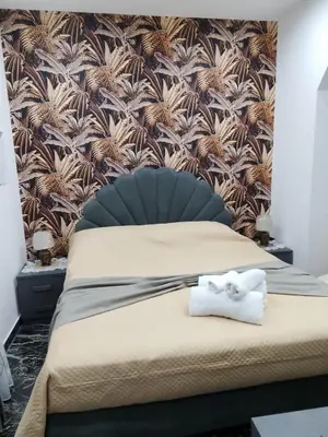 Letto o letti in una camera di Patrizia Ylenia Luxury Apartment