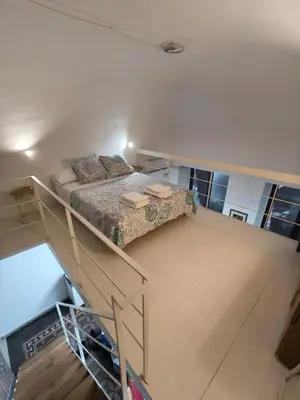Letto o letti in una camera di Casa Ludovica