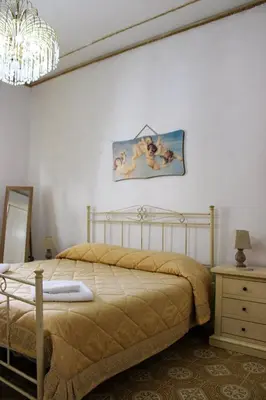 Letto o letti in una camera di Casa Vacanze 