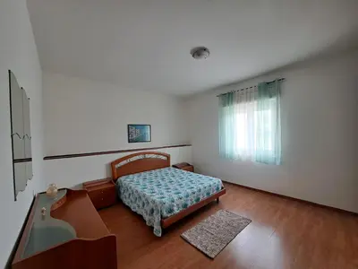 Letto o letti in una camera di A casa di Roy