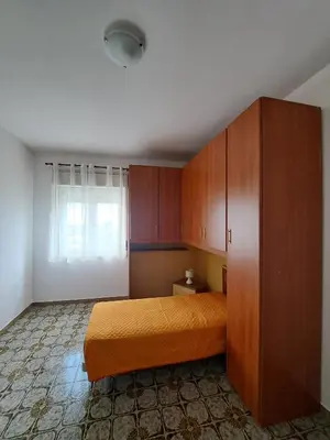 Letto o letti in una camera di A casa di Roy
