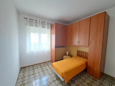 Letto o letti in una camera di A casa di Roy