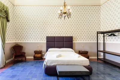 Letto o letti in una camera di Palazzo Giangreco Luxury Rooms