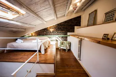 Letto o letti in una camera di Big Flat in City Center with Balcony