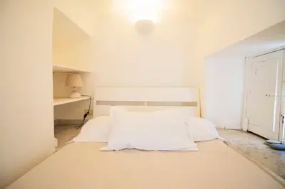Letto o letti in una camera di Big Flat in City Center with Balcony