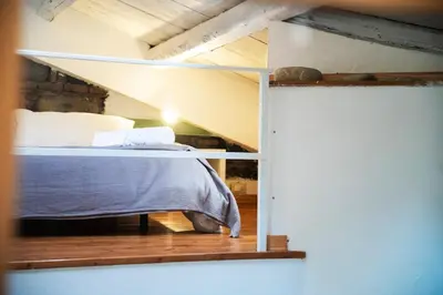 Letto o letti in una camera di Big Flat in City Center with Balcony