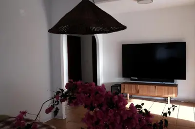 TV o dispositivi per l'intrattenimento presso A country house by the beach - Casa speranza