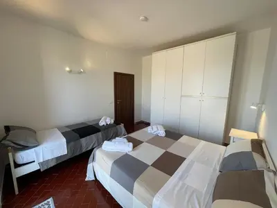Letto o letti in una camera di Villa fontane bianche