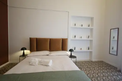 Letto o letti in una camera di Dimora Gentile