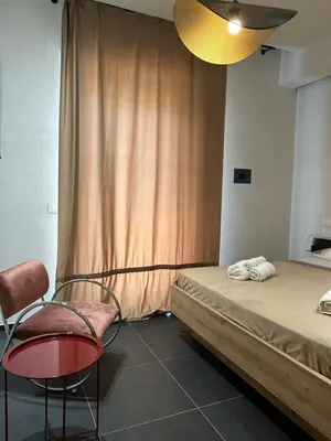 Letto o letti in una camera di Giù per la Costa - Siracusa