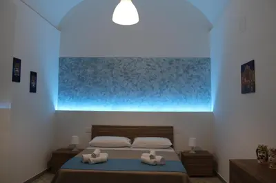 Letto o letti in una camera di M&M House-Terra di Mari, Terra di Santi