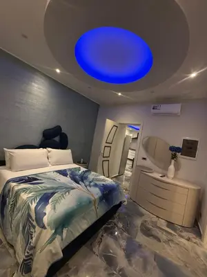 Letto o letti in una camera di Naomi Luxury Home 3
