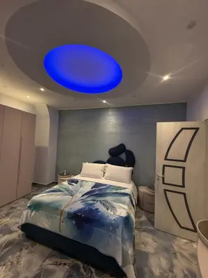 Letto o letti in una camera di Naomi Luxury Home 3